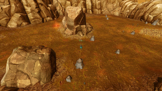 Das rote Leuchten verrät das Datacron hinter dem großen Felsen in der Senke.
