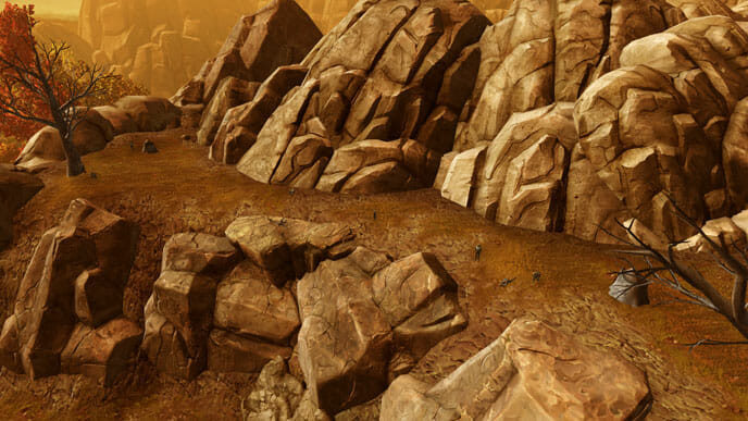 Der schmale Weg zwischen den Felsen führt in das abgeschlossene Tal.
